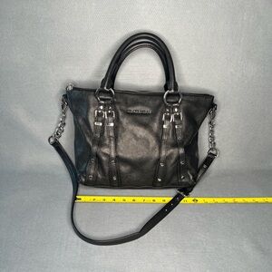Michael Kors black leather bag with silver accents.